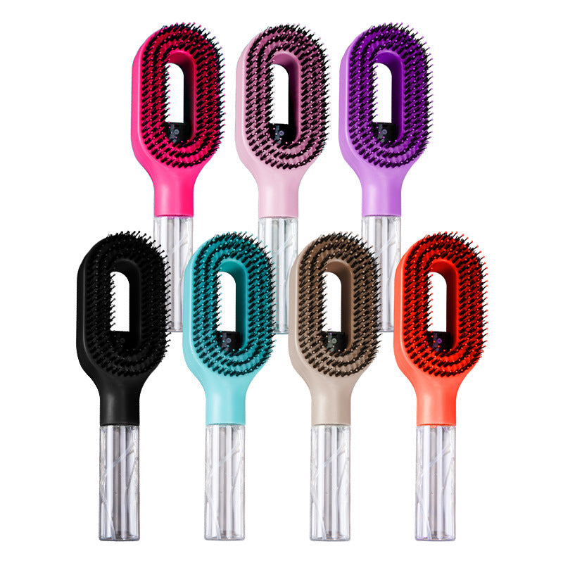 Water-spraying detangling hairbrush handle